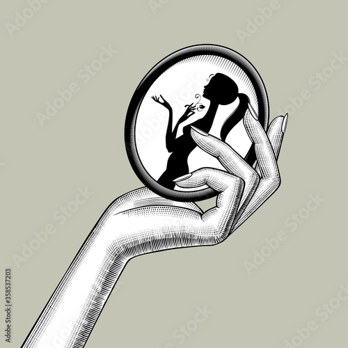 Engraved drawing of a female hand holds the image of a black silhouette of a young naked girl in a round frame