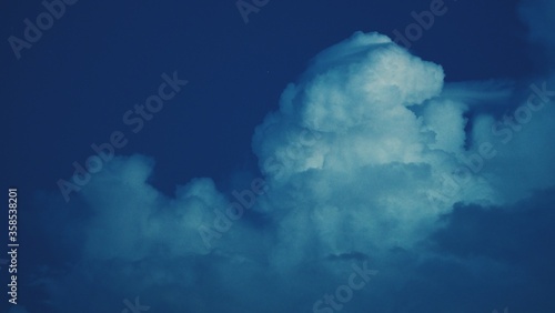 Blue sky white cloud white background. Beautiful sky and clouds in the afternoon in Sisaket,Thailand © JeffStocker
