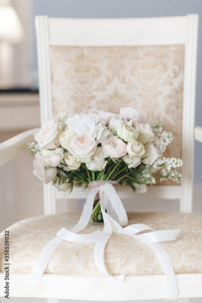 beautiful fresh wedding bouquet close up in room interior beautiful fresh wedding bouquet close up in room interior