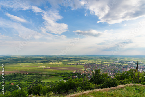 View from the top of the Vršac hill. Landscape of forest, fields and vineyards
