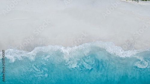 Fotografie Seychelles beach Indian ocean from drone, shore and mountains.