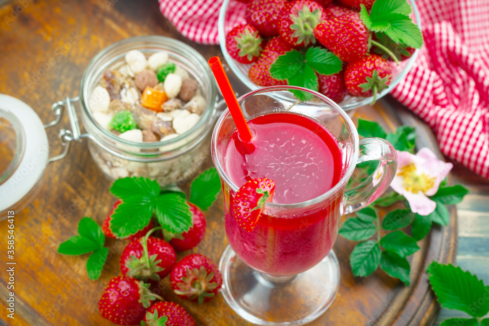 Ripe, fresh strawberries in a bowl on an old background. Ripe, fresh strawberries in a bowl on an old background.