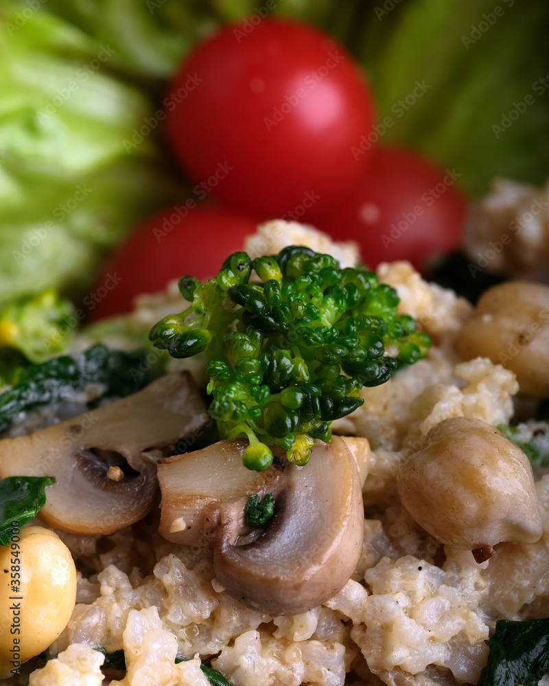 Close up of Vegan Salad of Couscous, Broccoli, Chick Pea and Mushroom Close up of Vegan Salad of Couscous, Broccoli, Chick Pea and Mushroom