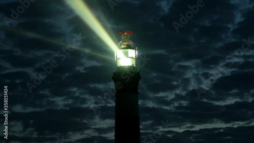 Night view on the creac'h lighthouse in Ushant island, brittany, france. This is the most powerful lighthouse in the world.