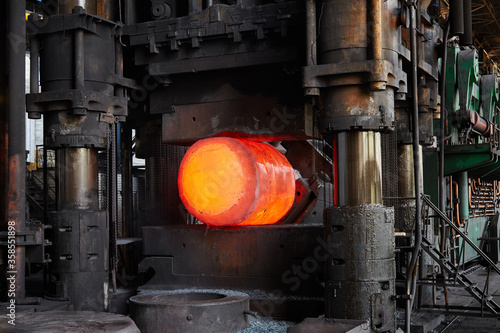 Press-Forging Shop. Forging a hot metal ingot.

