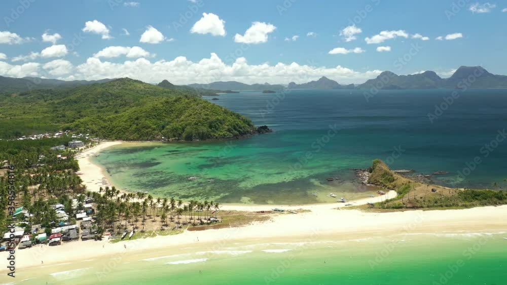 Nacpan Beach and Twin beach shores in El Nido Palawan Island Philippines, Aerial dolly out shot Nacpan Beach and Twin beach shores in El Nido Palawan Island Philippines, Aerial dolly out shot