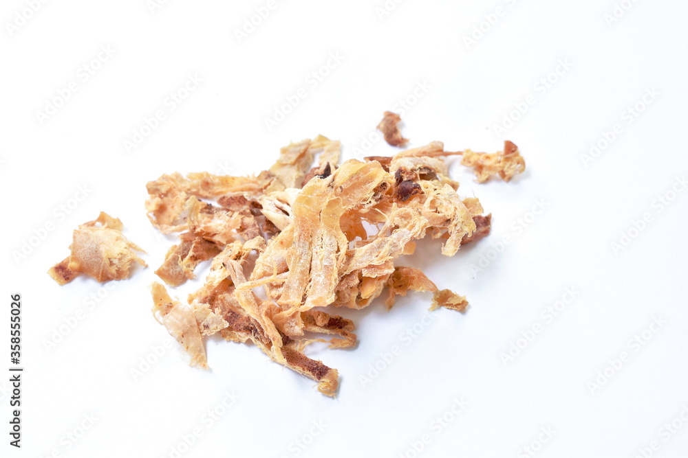 baked dry salty squid slice arranging on white background baked dry salty squid slice arranging on white background