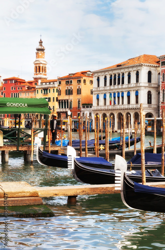 Italy. Typical beautiful landscape of Venice with gondolas on the Grand Canal near the Rialto Bridge