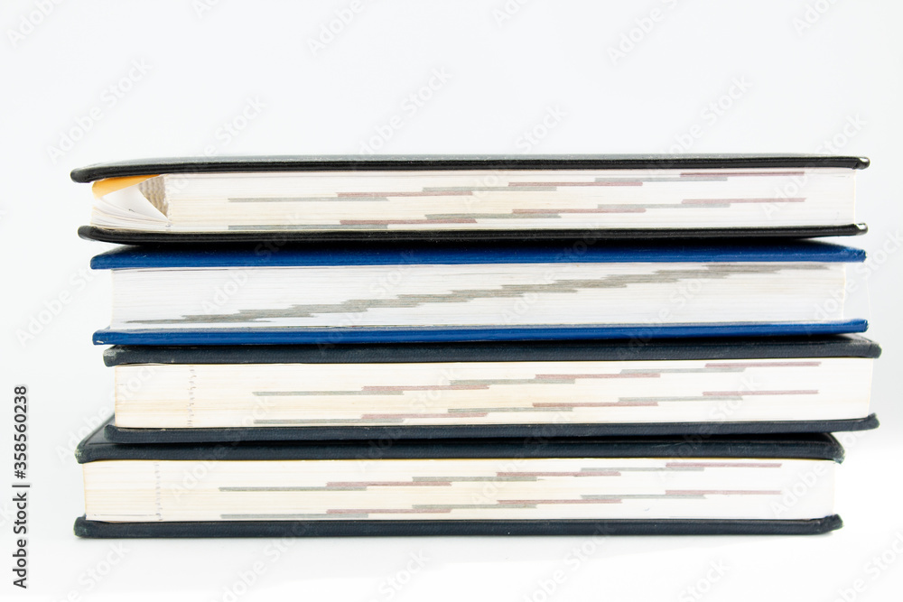 a stack of old books on a white background a stack of old books on a white background