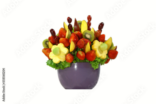 Fototapeta Naklejka Na Ścianę i Meble -  Assorted colorful fruits arranged into a decorative bouquet