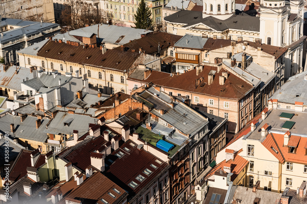 aerial view of houses with colorful roofs in historical center of lviv, ukraine