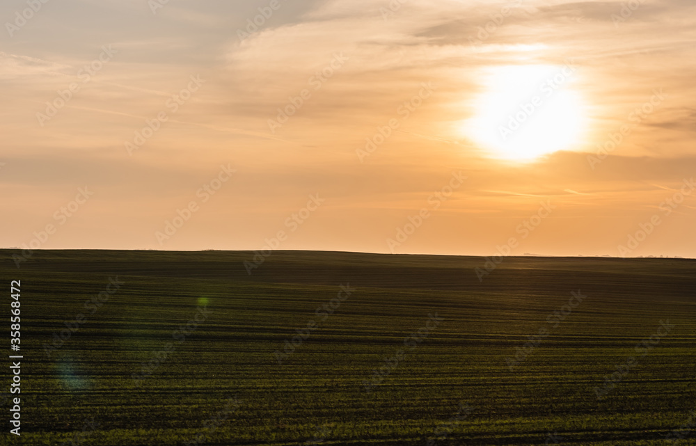 scenic landscape with mowed field in sunset in ukraine
