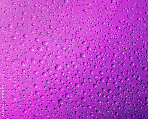 The texture of the water. Drops on a purple surface 