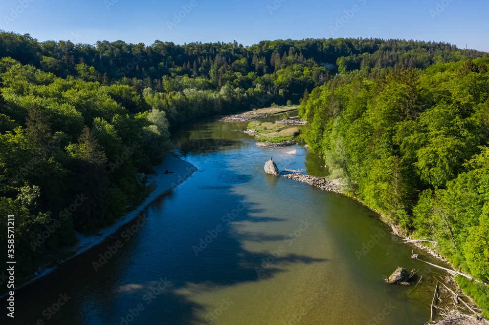 Isar river bird view in the south of Germany. River flowing to Danube river in south Germany drone aerial