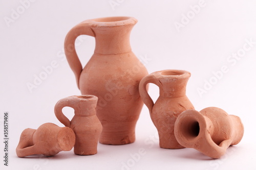 clay jug with his family