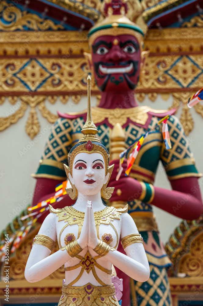 Statues of Devas by the Entrance of Wat Chayamangkalaram Buddhist Temple, George Town, Penang, Malaysia 