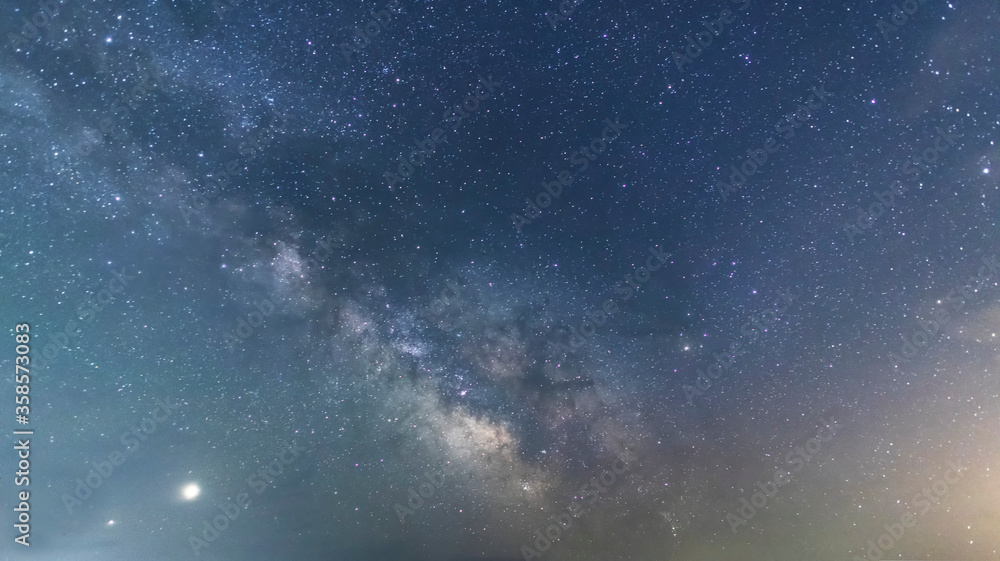 Obraz premium Beautiful starry sky with bright milky way galaxy. Night landscape. Astronomical background.