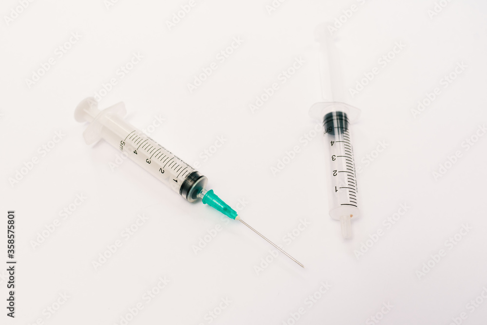 Two syringe on a white background. Two syringe on a white background.
