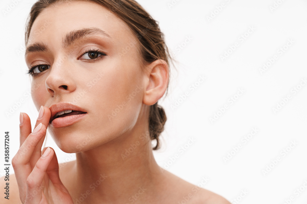 Image of beautiful caucasian young shirtless woman standing isolated Image of beautiful caucasian young shirtless woman standing isolated