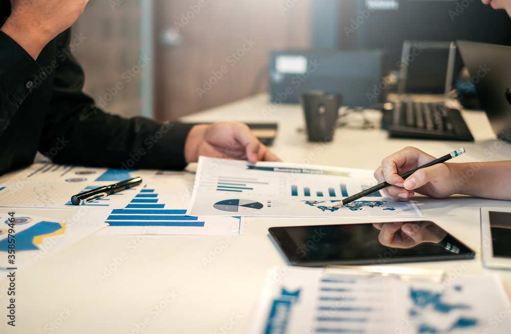 Investor group, business meeting and financial graph data analysis during the meeting.