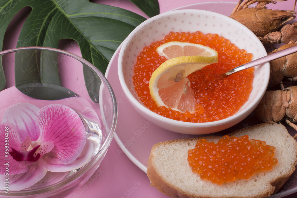 Red caviar and boiled crayfish. Light restaurant snack. Red caviar and boiled crayfish. Light restaurant snack.