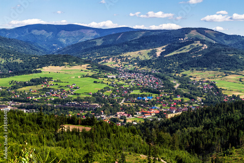 Fototapeta Naklejka Na Ścianę i Meble -  View of Polish Town Wegierska Gorka from Beskids Mountains