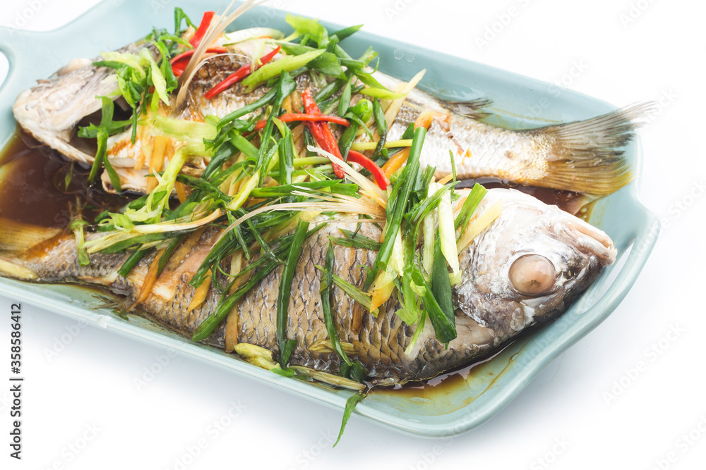 A plate of freshly steamed Grey Bream A plate of freshly steamed Grey Bream