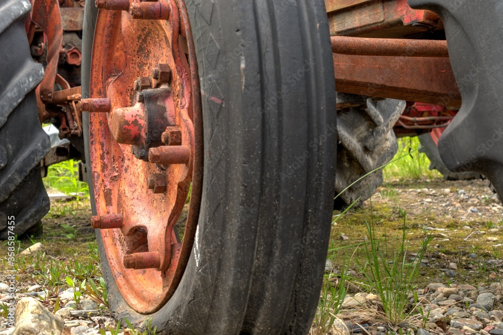 old red rusted tractor wheel old red rusted tractor wheel