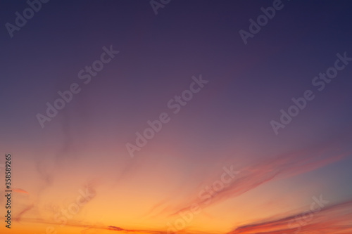 Dramatic colorful red purple to blue sunset or sunrise sky landscape. Natural beautiful cloudscape dawn background wallpaper. Stormy windy nature twilight dusk scene panorama © Kirill Gorlov