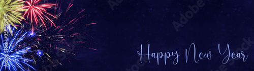 HAPPY NEW YEAR - Silvester background banner panorama long- Colorful firework on dark blue sky texture