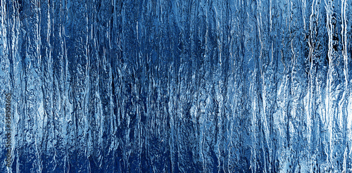 abstract background of blue color, corrugated glass © Yuri