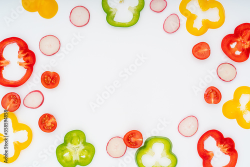 Fototapeta Naklejka Na Ścianę i Meble -  sliced  vegetables pattern for cooking design on white background top view flat lay.