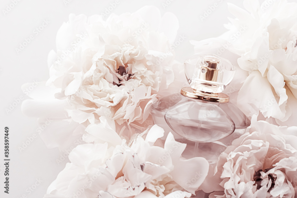 Violet Fragrance Bottle As Luxury Perfume Product On Background Of Peony  Flowers, Parfum Ad And Beauty Branding Design Stock Photo, Picture and  Royalty Free Image. Image 149590294.