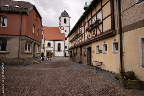Cityview of Street of Waldenburg with Old Church Tower and Buildings  Germany Europa