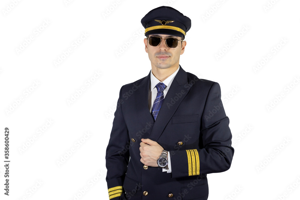 Male pilot with uniform + jacket, wearing pilot glasses and pilot hat, posing with confidence, holding his jacket with hand Male pilot with uniform + jacket, wearing pilot glasses and pilot hat, posing with confidence, holding his jacket with hand