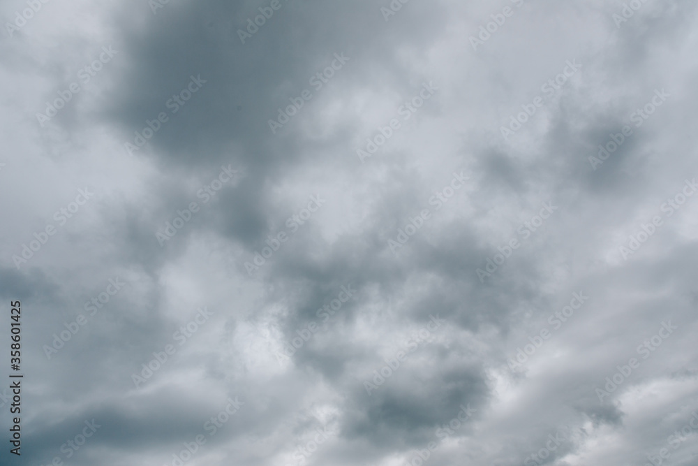 Dark clouds move across the sky