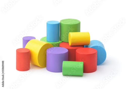 Group of colorful wooden toy cylinders