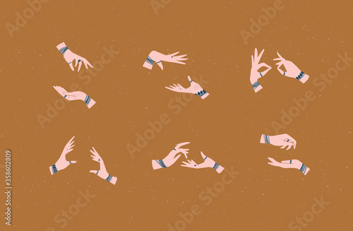 Obraz na płótnie Hands pair with bracelets and rings in ethnical style in different positions to express emotions drawing on mustard background w salonie