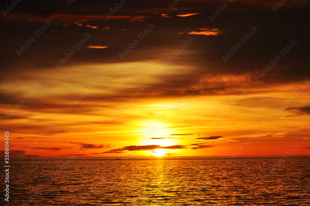 Golden sunset in the horizon of ocean