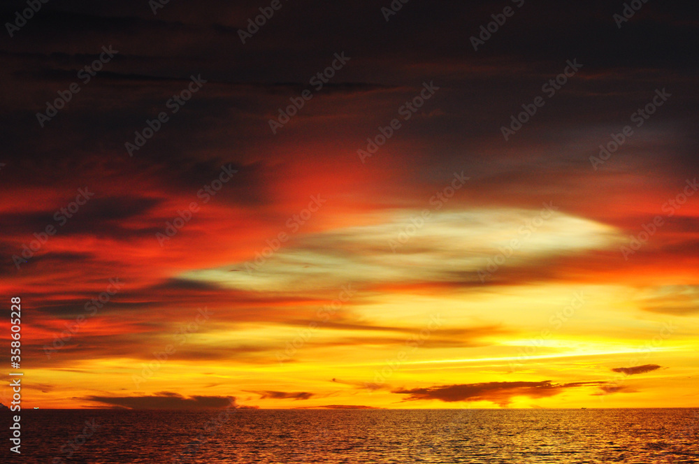 Golden sunset in the horizon of ocean