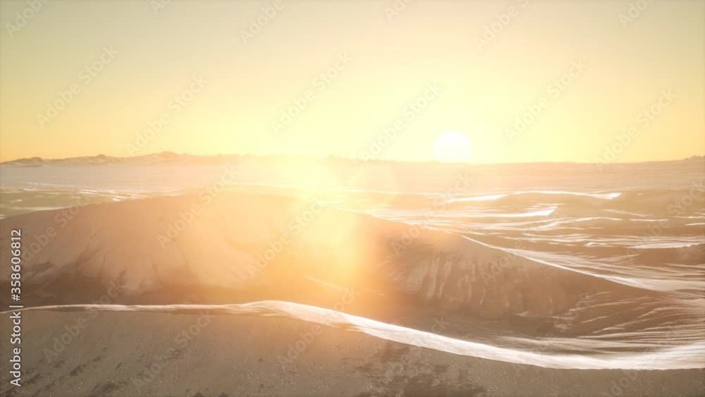 aerial of the red sand desert dunes at sunset aerial of the red sand desert dunes at sunset