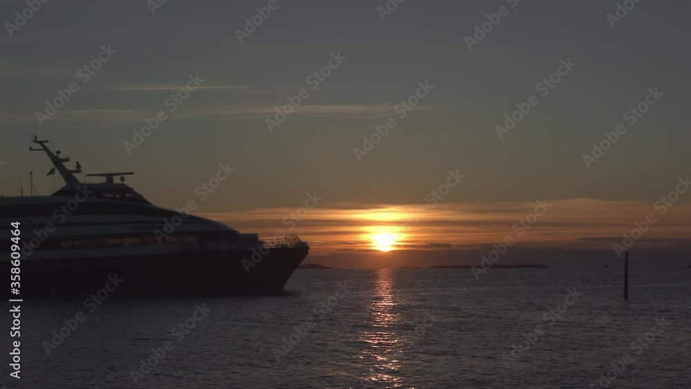 silhoutte view boat passing sunset scenery silhoutte view boat passing sunset scenery