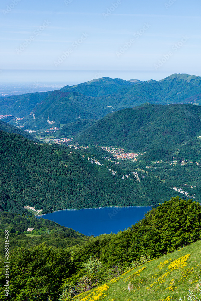 The view of Lake Como during a spring hike in the Alps near the town of Lecco, Lombardy, Italy - May 2020