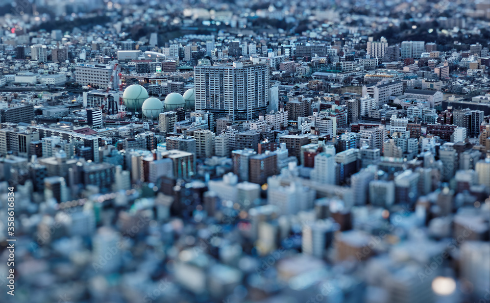 Narrow focus on part of an aerial view of sprawling cityscape