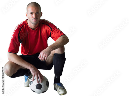 Cut Out of Soccer Player with football © moodboard