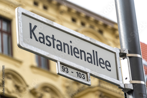 Kastanienallee street name sign in Berlin Prenzlauer Berg district, Germany photo