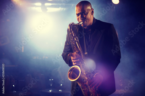 Man Playing Saxophone on Stage