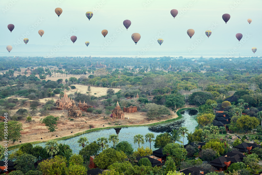 Hot air balloons over the Bagan plain at sunrise