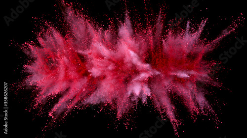 Fotografie, Obraz Launched colorful powder on black background, freeze motion