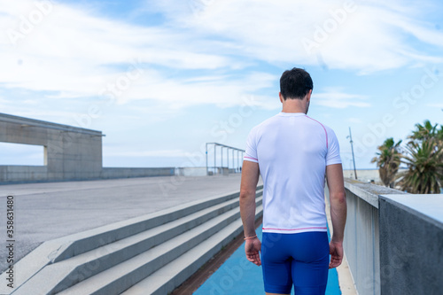 Fototapeta Naklejka Na Ścianę i Meble -  Young man running, motivation concept